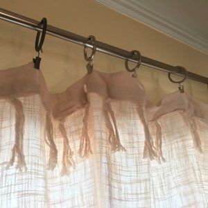 Creme curtain .  may be linen - Almost white curtain with tassles